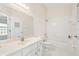 Bathroom with a bathtub and shower, a toilet, and vanity with storage space at 4619 Barnacle Dr, Port Orange, FL 32127