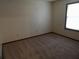 Simple bedroom with carpeted floor and window at 641 Fairhaven St, Deltona, FL 32725