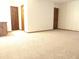 Primary bedroom with carpet, double doors, and walk-in closet at 641 Fairhaven St, Deltona, FL 32725