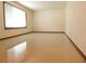 Spacious living room featuring large window and tile floors at 641 Fairhaven St, Deltona, FL 32725