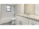 Updated bathroom with granite countertops, marble tile accents, and modern fixtures at 779 Victoria E Cir, Ormond Beach, FL 32174