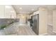 Bright and spacious kitchen featuring modern appliances and granite countertops at 779 Victoria E Cir, Ormond Beach, FL 32174
