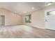 Bright, open living room with sleek floors, neutral paint, and modern lighting; an inviting space to relax and entertain at 779 Victoria E Cir, Ormond Beach, FL 32174