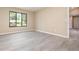 Open living room with modern floors, neutral paint, and an abundance of natural light at 779 Victoria E Cir, Ormond Beach, FL 32174