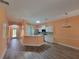Eat-in kitchen with stainless steel appliances and breakfast bar at 821 Wingate Trl, Port Orange, FL 32128