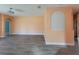 Open living room with stylish flooring, neutral color palette, and recessed lighting at 821 Wingate Trl, Port Orange, FL 32128