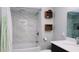 Bathroom with shower/tub combo, vanity, and updated fixtures at 855 E Church St, Deland, FL 32724