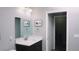 Clean bathroom with a vanity and linen closet at 855 E Church St, Deland, FL 32724