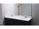 Modern bathroom with double vanity and white countertops at 855 E Church St, Deland, FL 32724