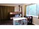 Bedroom with bunk beds, window, and storage at 855 E Church St, Deland, FL 32724