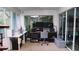 Sunroom with work station and plenty of natural light at 855 E Church St, Deland, FL 32724