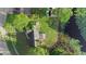 House nestled on a spacious lot with lake access at 2573 Delaware Rd, Deltona, FL 32738