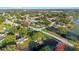 Aerial view of a residential neighborhood near a lake at 2573 Delaware Rd, Deltona, FL 32738