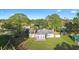 Aerial view shows a single-story home with a large backyard at 2573 Delaware Rd, Deltona, FL 32738
