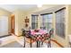 Charming dining area with bay window and table for four at 2573 Delaware Rd, Deltona, FL 32738