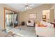 Spacious living room with access to a screened patio at 2573 Delaware Rd, Deltona, FL 32738