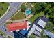 Aerial view of building and parking lot, showing building features at 404 S Beach St # 010 101, Daytona Beach, FL 32114