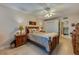 Charming bedroom with wood bed frame and ensuite bathroom access at 404 S Beach St # 010 101, Daytona Beach, FL 32114
