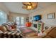 Relaxing living room featuring a fireplace and comfy seating at 404 S Beach St # 010 101, Daytona Beach, FL 32114