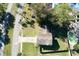 Aerial view showing house, yard, and pool at 453 Merrimac Dr, Port Orange, FL 32127