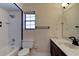 Small bathroom with shower/tub, toilet, and vanity at 453 Merrimac Dr, Port Orange, FL 32127