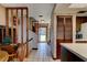 Home entryway with staircase and views to the kitchen at 453 Merrimac Dr, Port Orange, FL 32127