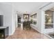 Bright dining area with tile floors and access to backyard at 1275 Elkcam Blvd, Deltona, FL 32725