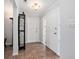 Inviting entryway with tile floors and ample storage at 1275 Elkcam Blvd, Deltona, FL 32725
