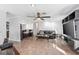 Open living room with kitchen bar and comfortable seating at 1275 Elkcam Blvd, Deltona, FL 32725