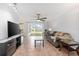 Spacious living room with sliding doors leading to the patio at 1275 Elkcam Blvd, Deltona, FL 32725