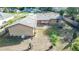 Landscaped backyard with mature trees and spacious lawn at 1391 San Carlos Ave, Deltona, FL 32738