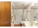 Bathroom with shower/tub combo and a single vanity at 1391 San Carlos Ave, Deltona, FL 32738