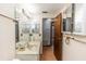 Clean bathroom with double vanity and a bathtub at 1391 San Carlos Ave, Deltona, FL 32738