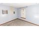 Bright bedroom featuring a window with blinds and neutral walls at 1391 San Carlos Ave, Deltona, FL 32738