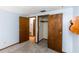 Spacious bedroom with built-in closet and access to bathroom at 1391 San Carlos Ave, Deltona, FL 32738