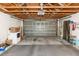 Large garage with automatic opener and ample storage space at 1391 San Carlos Ave, Deltona, FL 32738