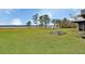 Spacious backyard with a view of the water at 180 Robinson Ln, Seville, FL 32190