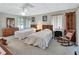 Twin bedroom with two beds and a rocking chair at 180 Robinson Ln, Seville, FL 32190