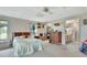 Comfortable bedroom with a queen-size bed and en-suite bathroom access at 180 Robinson Ln, Seville, FL 32190
