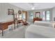 Spacious bedroom with twin beds and a vanity area at 180 Robinson Ln, Seville, FL 32190