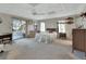 Cozy bedroom with a queen-size bed and direct access to a patio at 180 Robinson Ln, Seville, FL 32190
