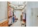 Large walk-in closet with ample shelving and hanging space at 180 Robinson Ln, Seville, FL 32190