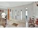 Inviting entryway with double doors and tiled floor at 180 Robinson Ln, Seville, FL 32190