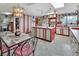 Retro kitchen with red and white cabinets and an island at 180 Robinson Ln, Seville, FL 32190