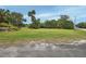 Spacious property lot with lush grass and mature trees at 180 Robinson Ln, Seville, FL 32190