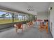 Spacious screened porch overlooking the water at 180 Robinson Ln, Seville, FL 32190
