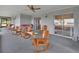 Relaxing screened porch with wooden rocking chairs at 180 Robinson Ln, Seville, FL 32190
