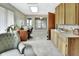 Studio space with kitchenette, desk, and seating area at 180 Robinson Ln, Seville, FL 32190