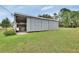 Large workshop with sliding doors and plenty of space at 180 Robinson Ln, Seville, FL 32190