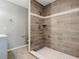 Modern bathroom with a large walk-in shower and tile surround at 2129 Lime Tree Dr, Edgewater, FL 32141